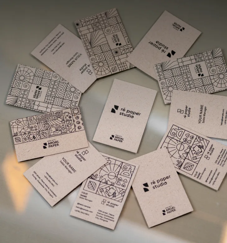 A ring of argal business cards with line-art backs