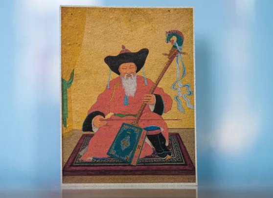 Card printed with a painting of a morin khuur player