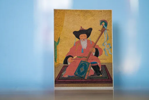 Postcard printed with a painting of a morin khuur player